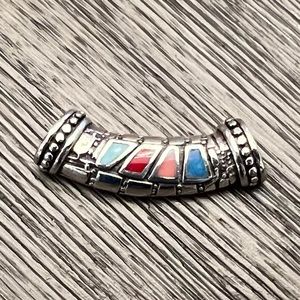 Silver Slide with multiple stones.